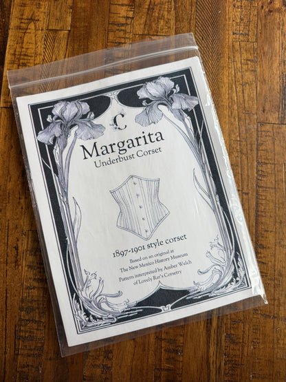 Card with 'Margarita' design on a wooden surface