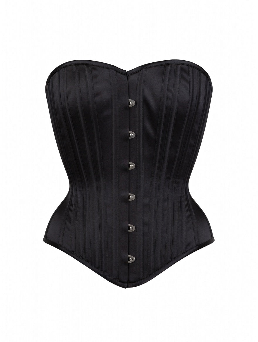 Black corset with silver buttons on a white background