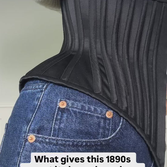 video of black corset on jeans